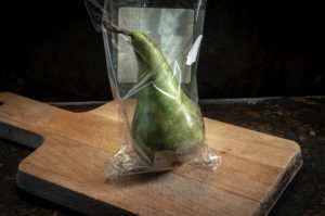 pear packed in non-biodegradable plastics pear packed in non-biodegradable plastics